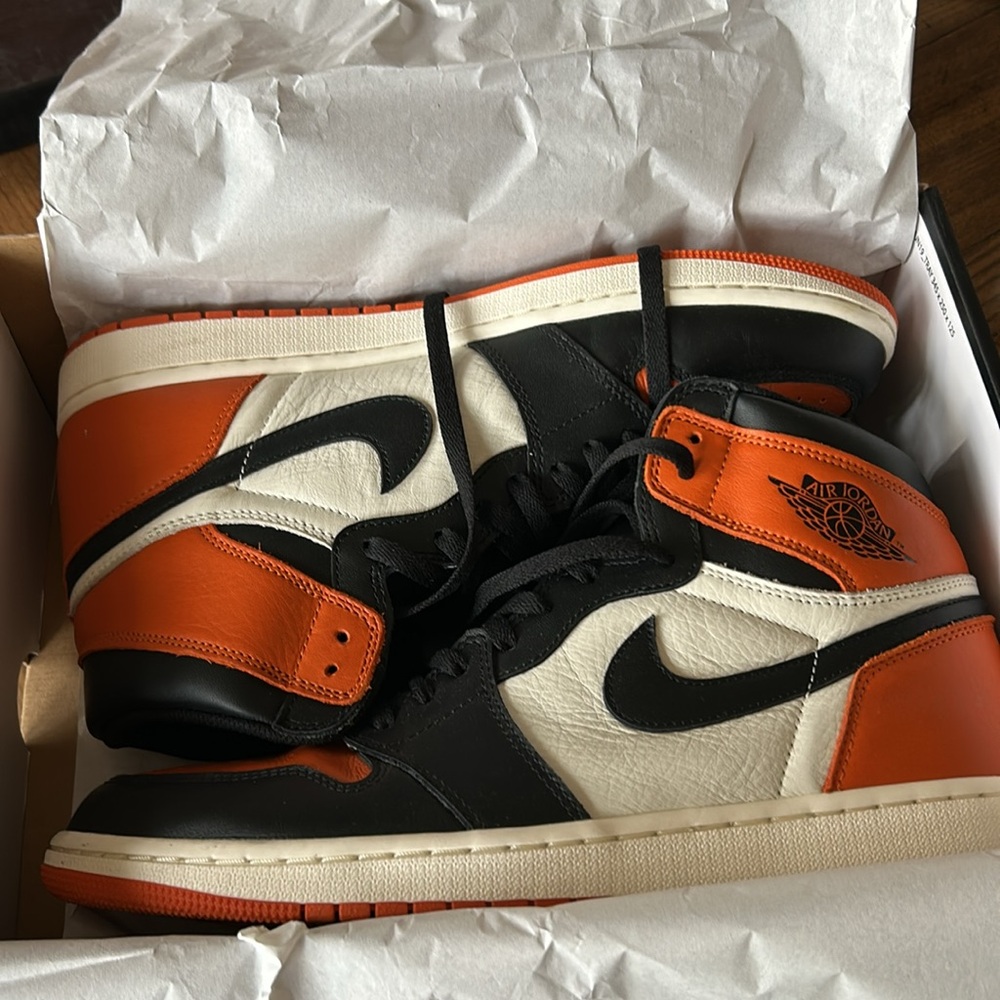 Air Jordan 1 retro high OG; black/starfish – sail. Sz13; shattered backboard.